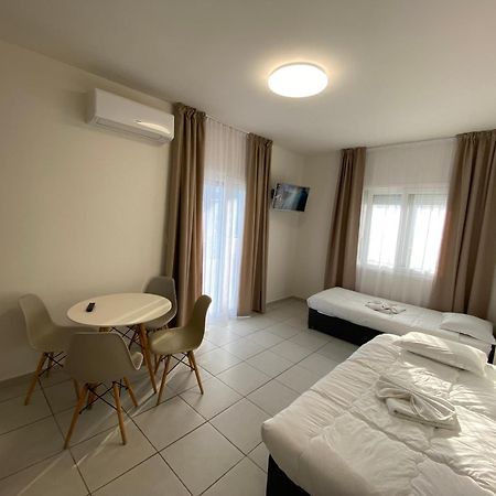 Opalium Beach Front Suites Potos Bagian luar foto
