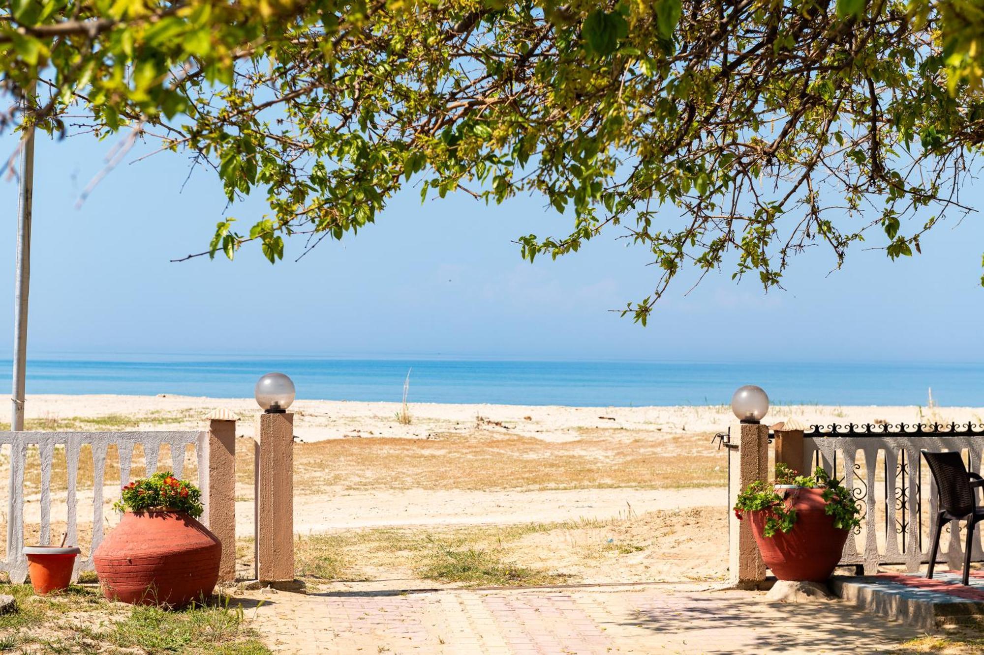 Opalium Beach Front Suites Potos Bagian luar foto