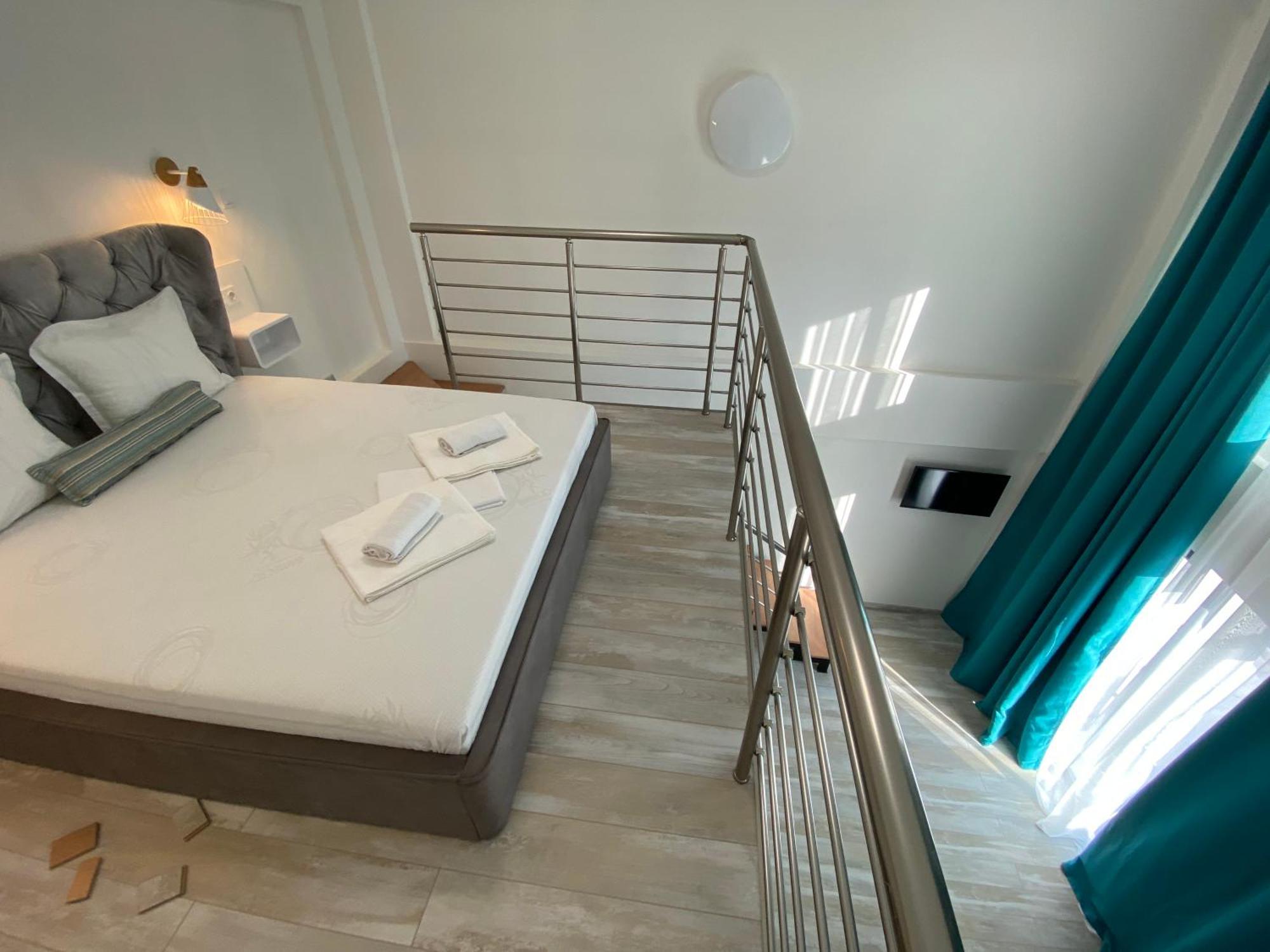 Opalium Beach Front Suites Potos Bagian luar foto