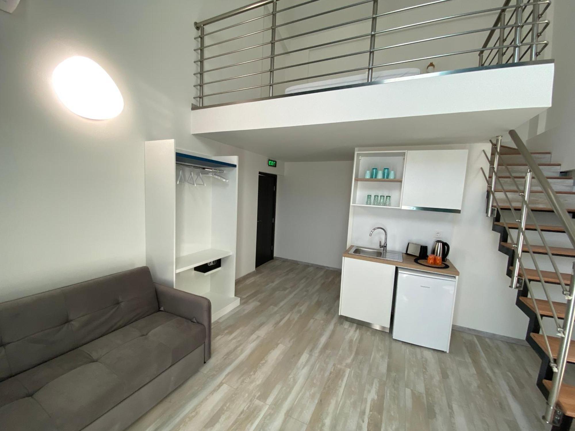 Opalium Beach Front Suites Potos Bagian luar foto
