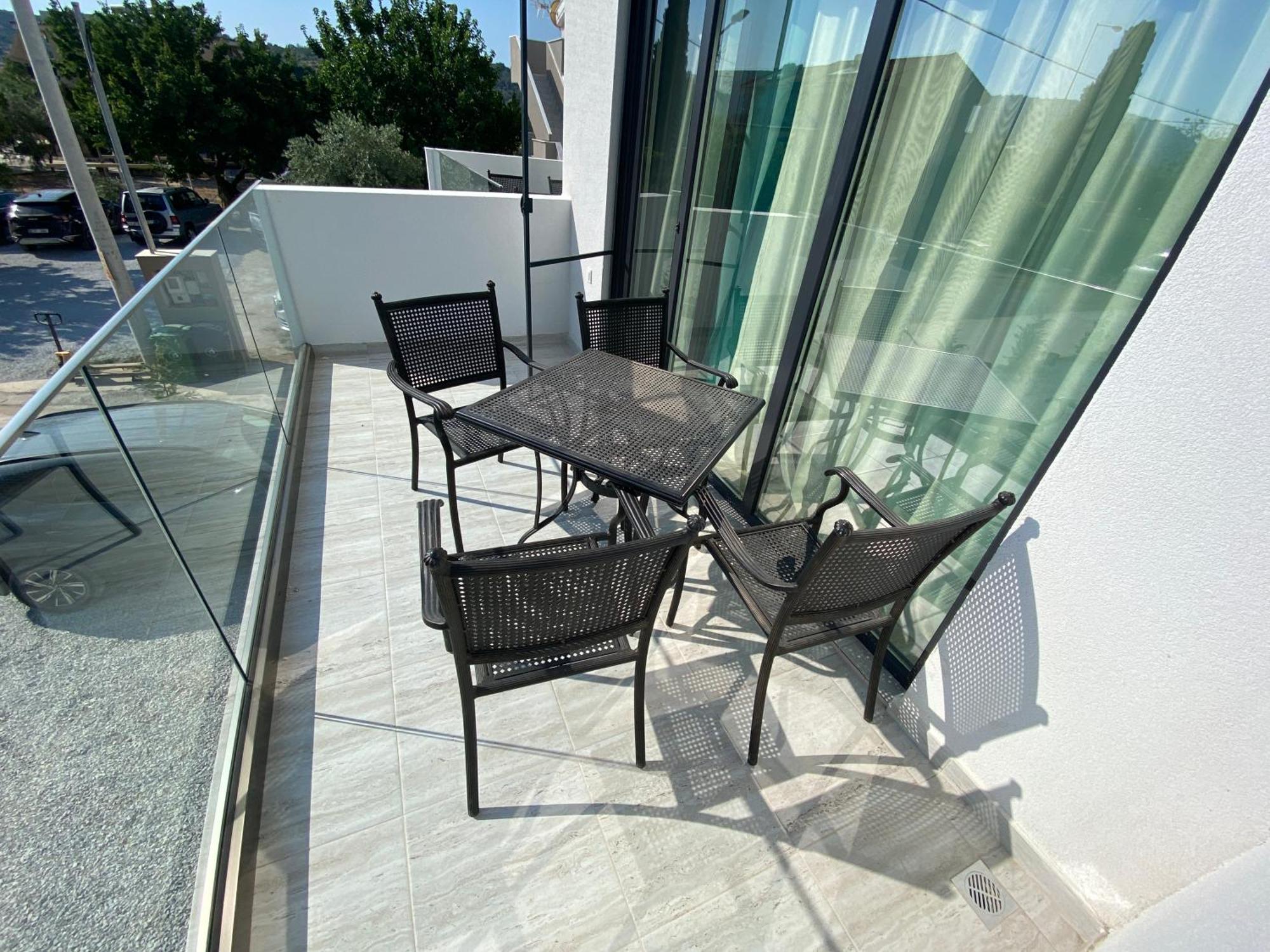 Opalium Beach Front Suites Potos Bagian luar foto