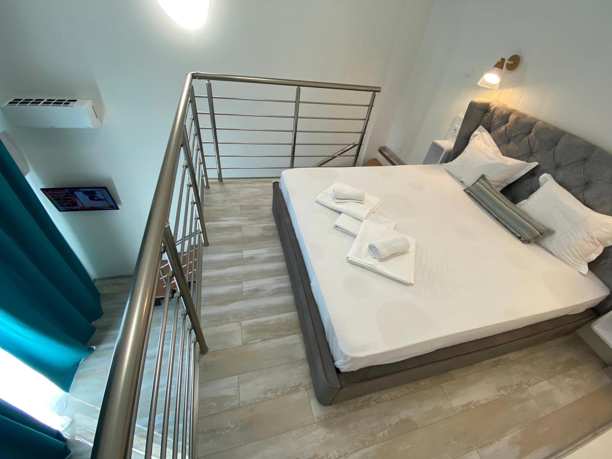 Opalium Beach Front Suites Potos Bagian luar foto